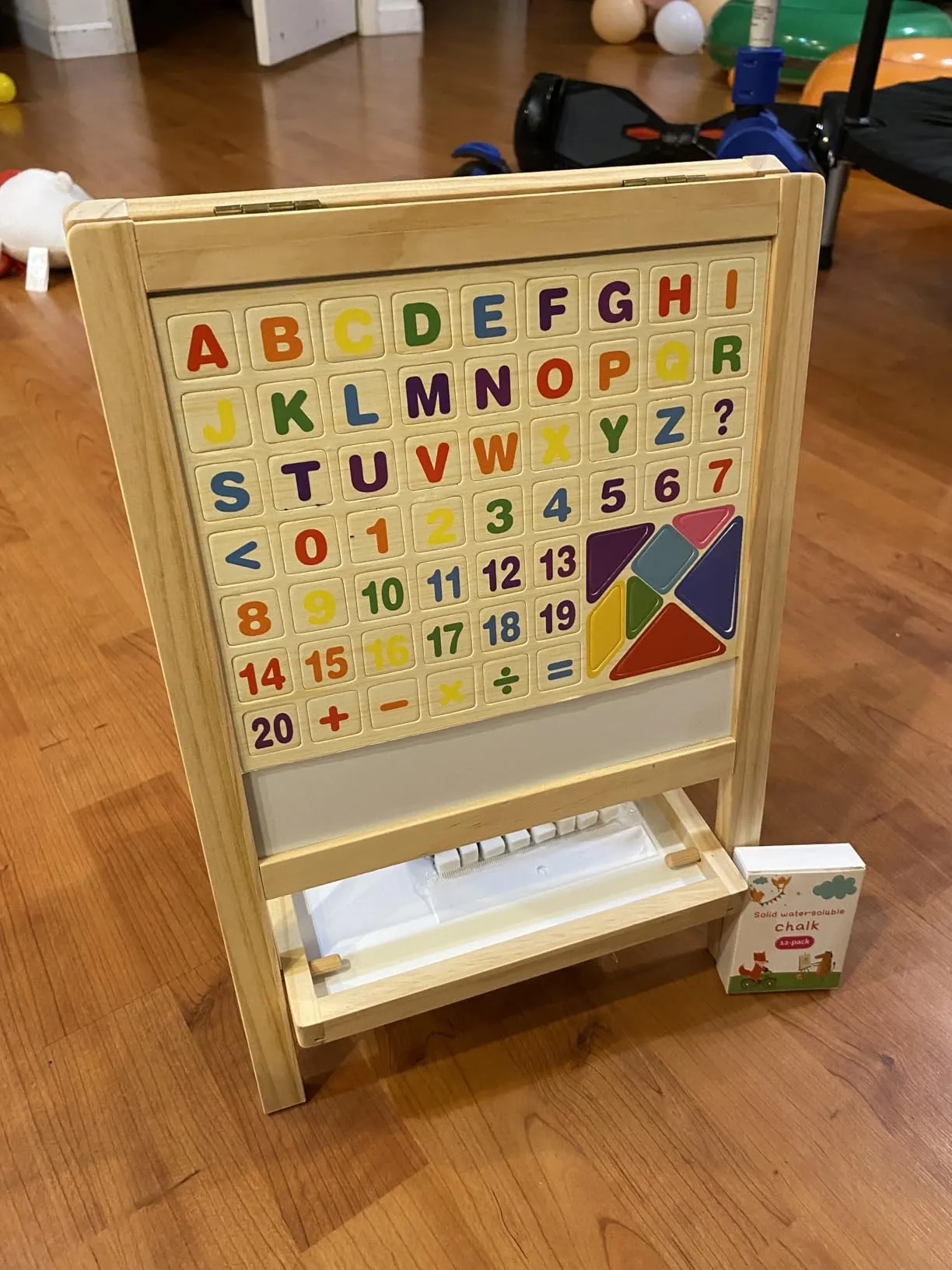 All alphabet and number tiles arranged on board